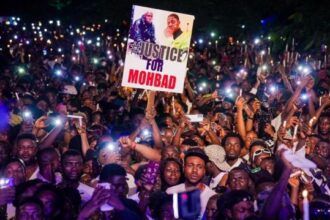 Mohbad's supporters during the candlelight